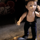 An old baby doll is repurposed as a grizzled, shirtless detective in AMC's stop motion series Ultra City Smiths.